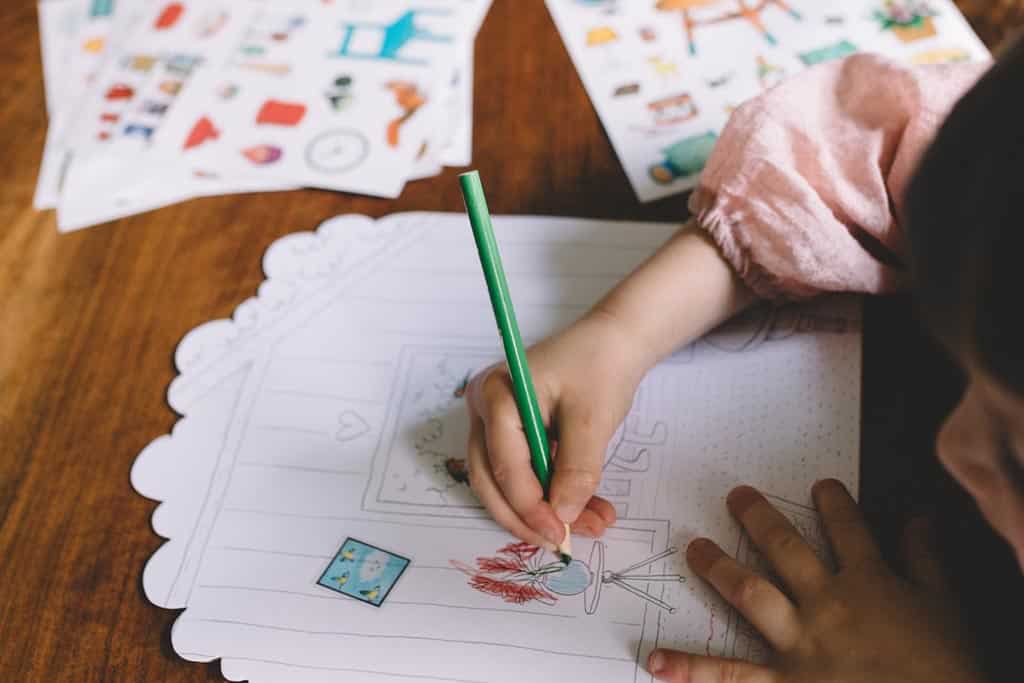 A child colouring in a picture