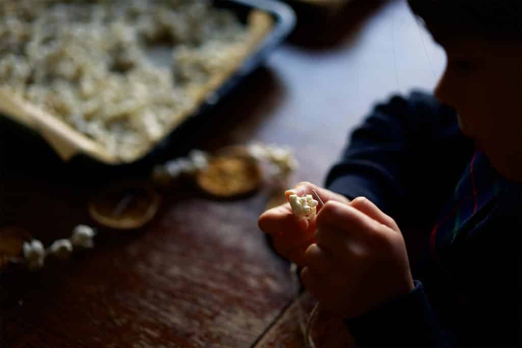 A child enjoying threading activities