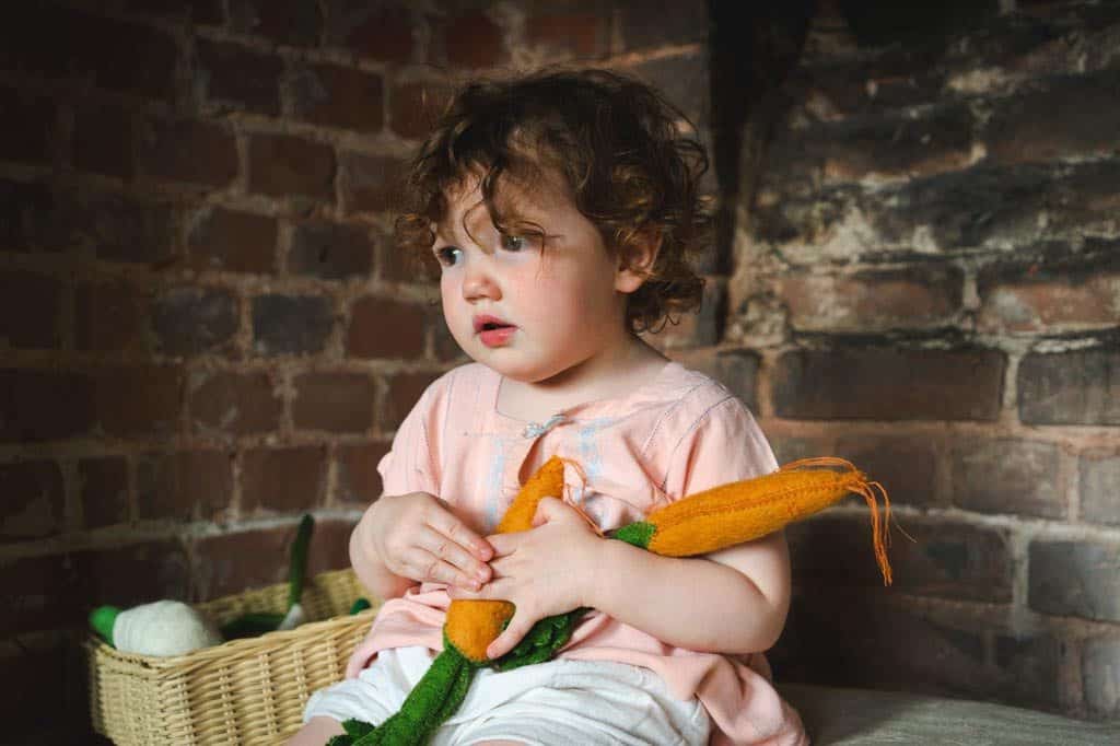 Child with play food