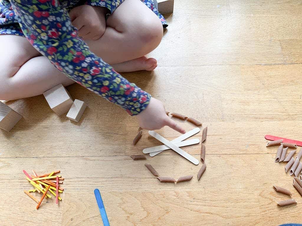 Compass made from sticks and pasta