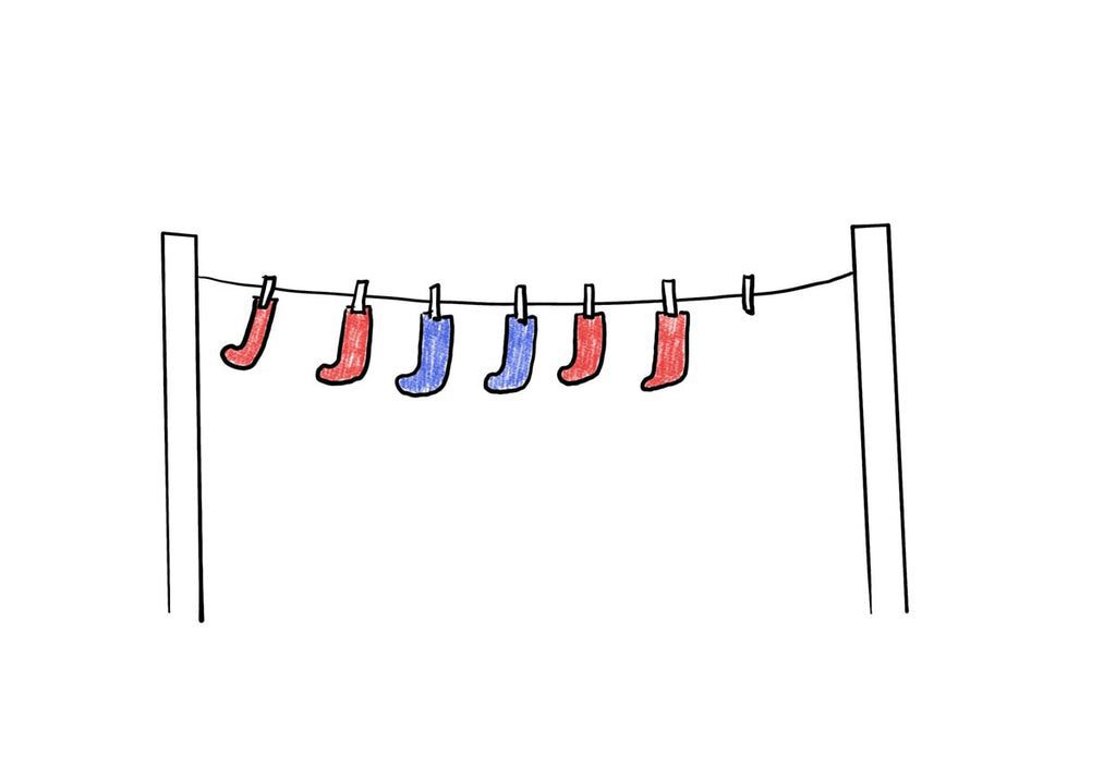 Matching pairs of socks on a washing line