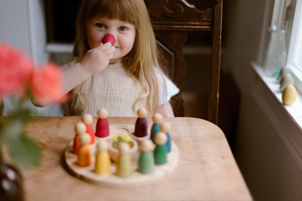 Child playing with Grapat Perpetual Calendar