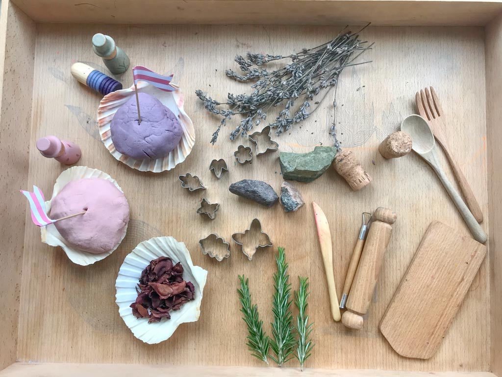 Homemade rose and lavender playdough with cutters and rollers