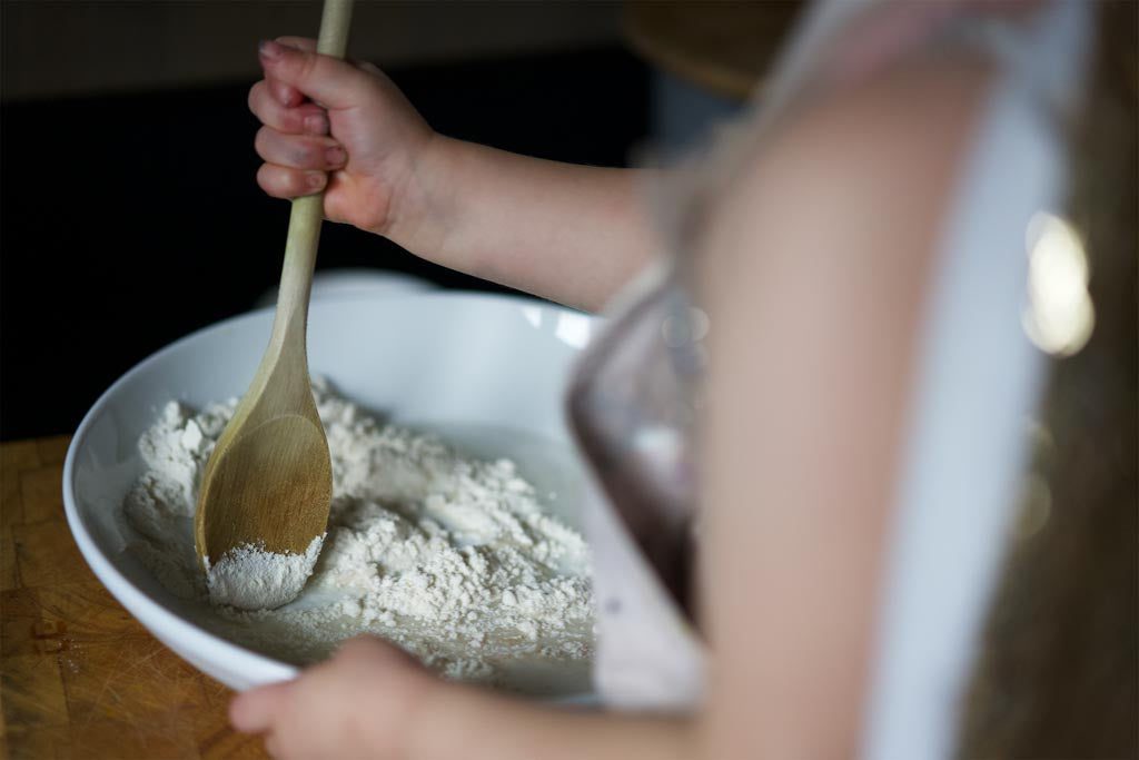 Stirring salt dough ingredients