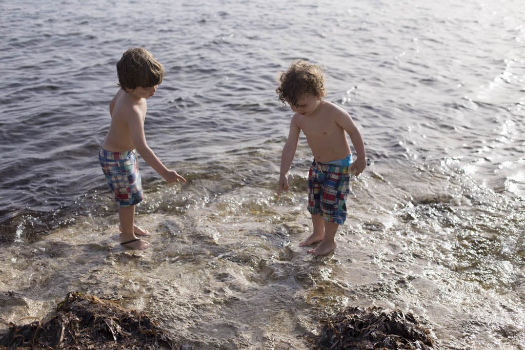 Two boys playing in the sea