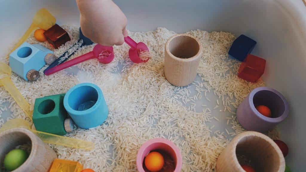 A basic sensory bin with rice