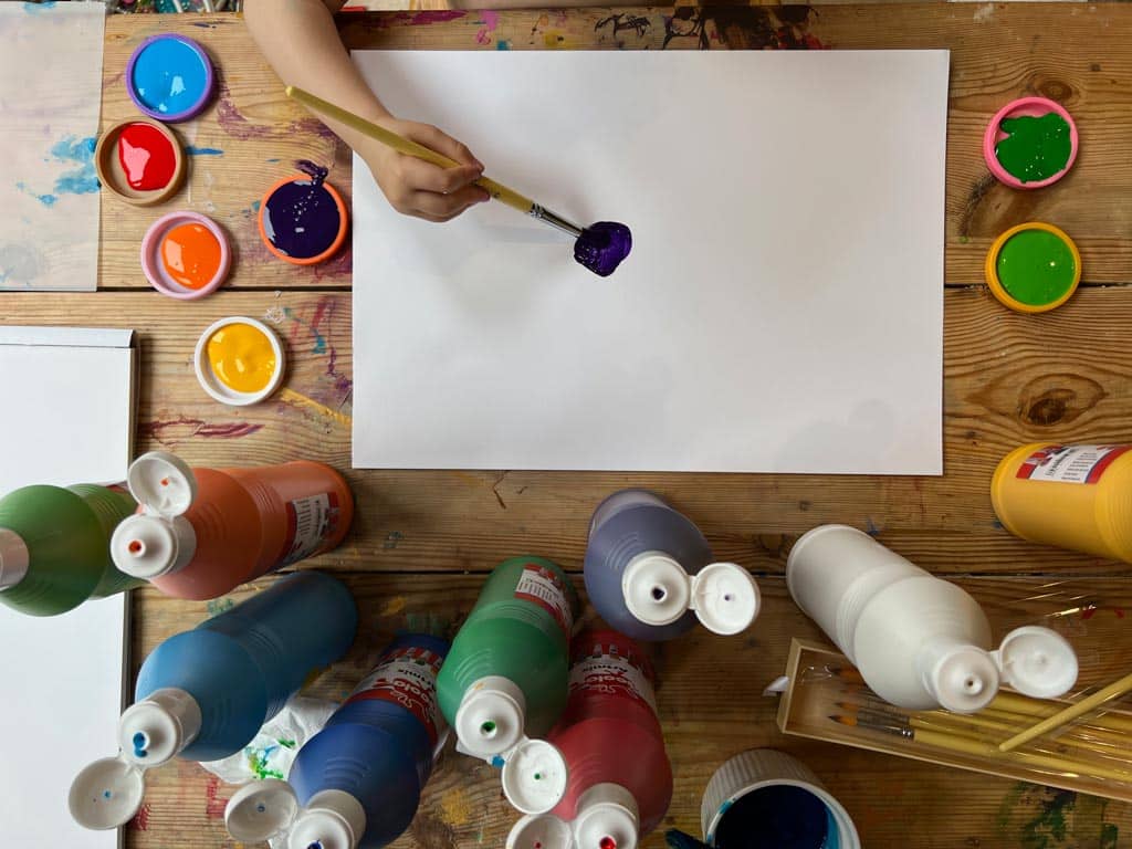 Process art - a child experimenting with paint and forms