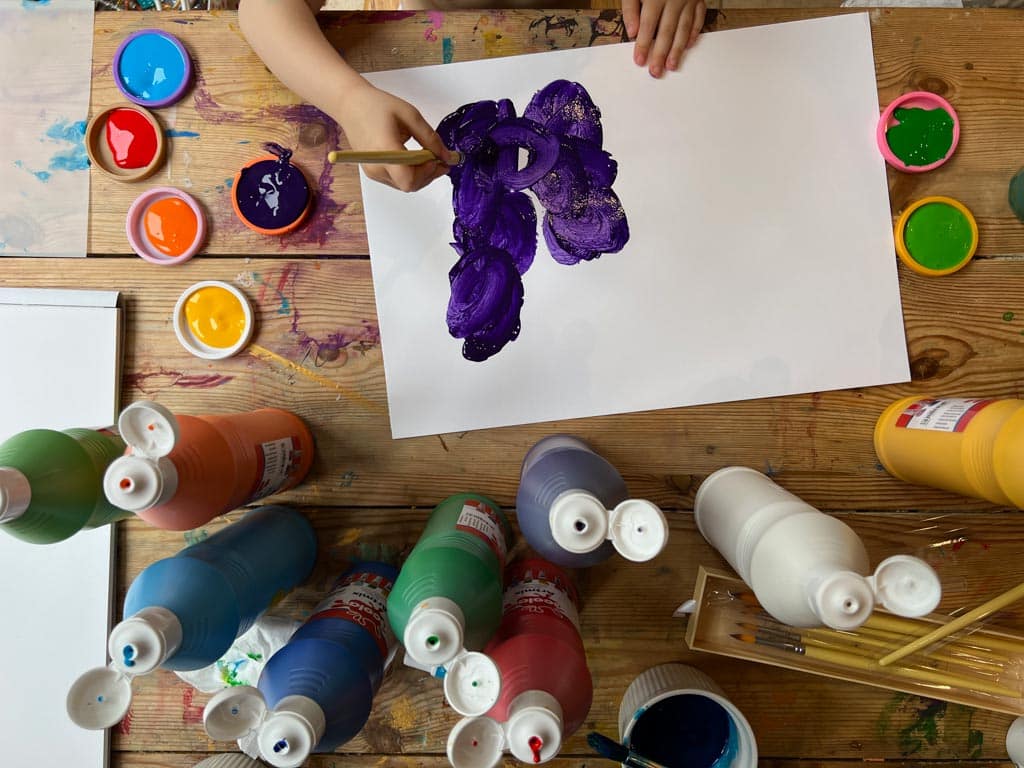 Process art - a child experimenting with paint and forms