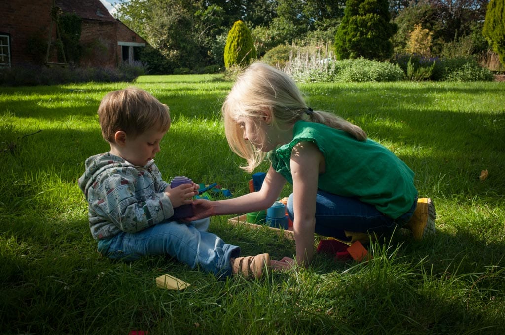 Two children playing associatively